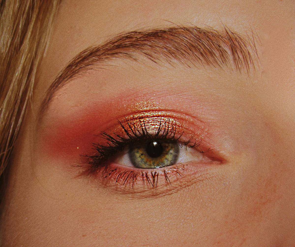 Step-by-step theatrical makeup tutorials showing layered application and sealing process